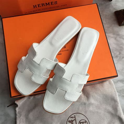 female hermes slippers.